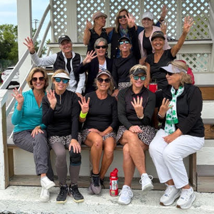 Leagues at Courtside Tennis Club, Venice Florida - group photo of players seated in gazebo
