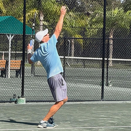 Courtside Tennis Club, Venice, Florida - player serving